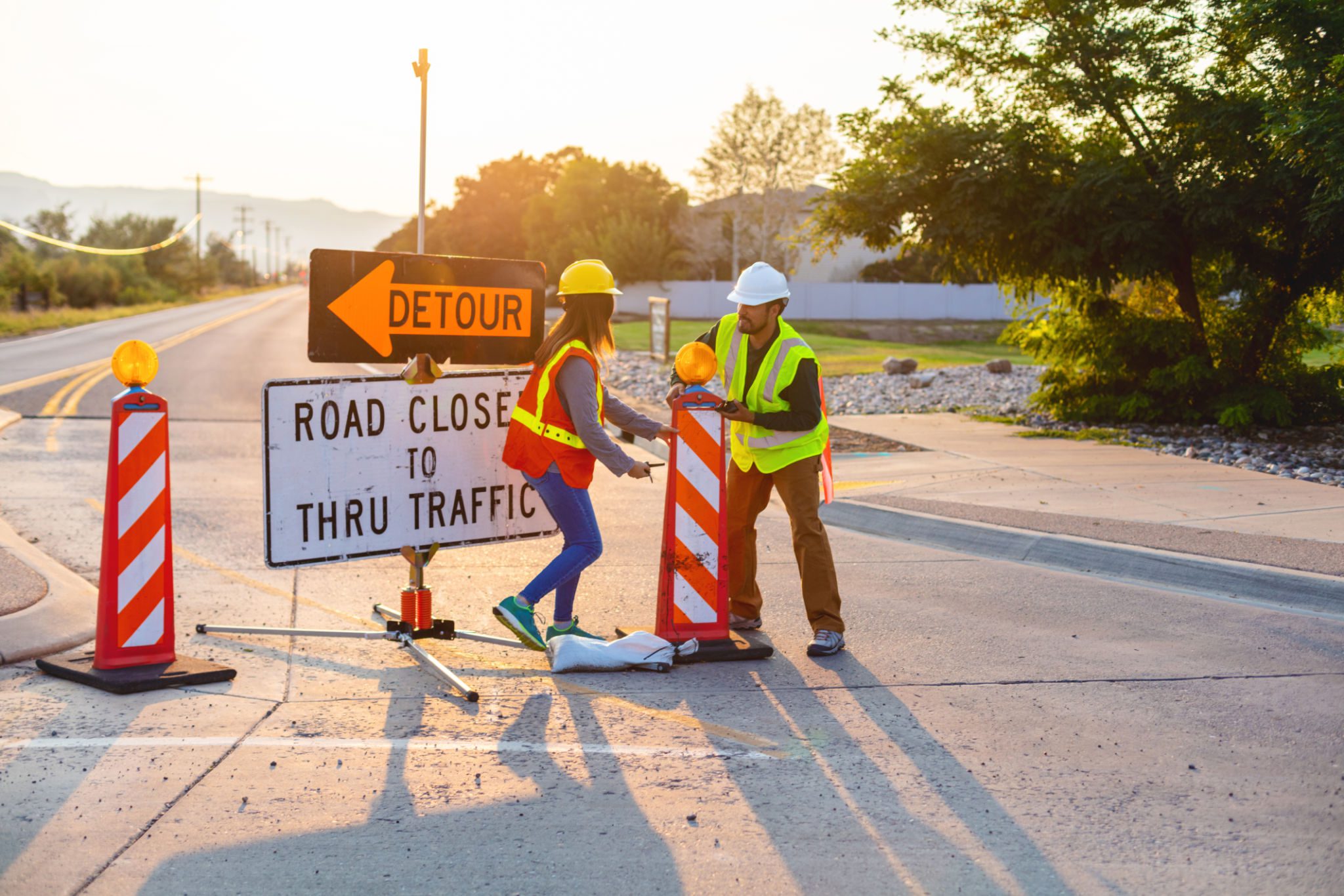 Road closed with detour sign