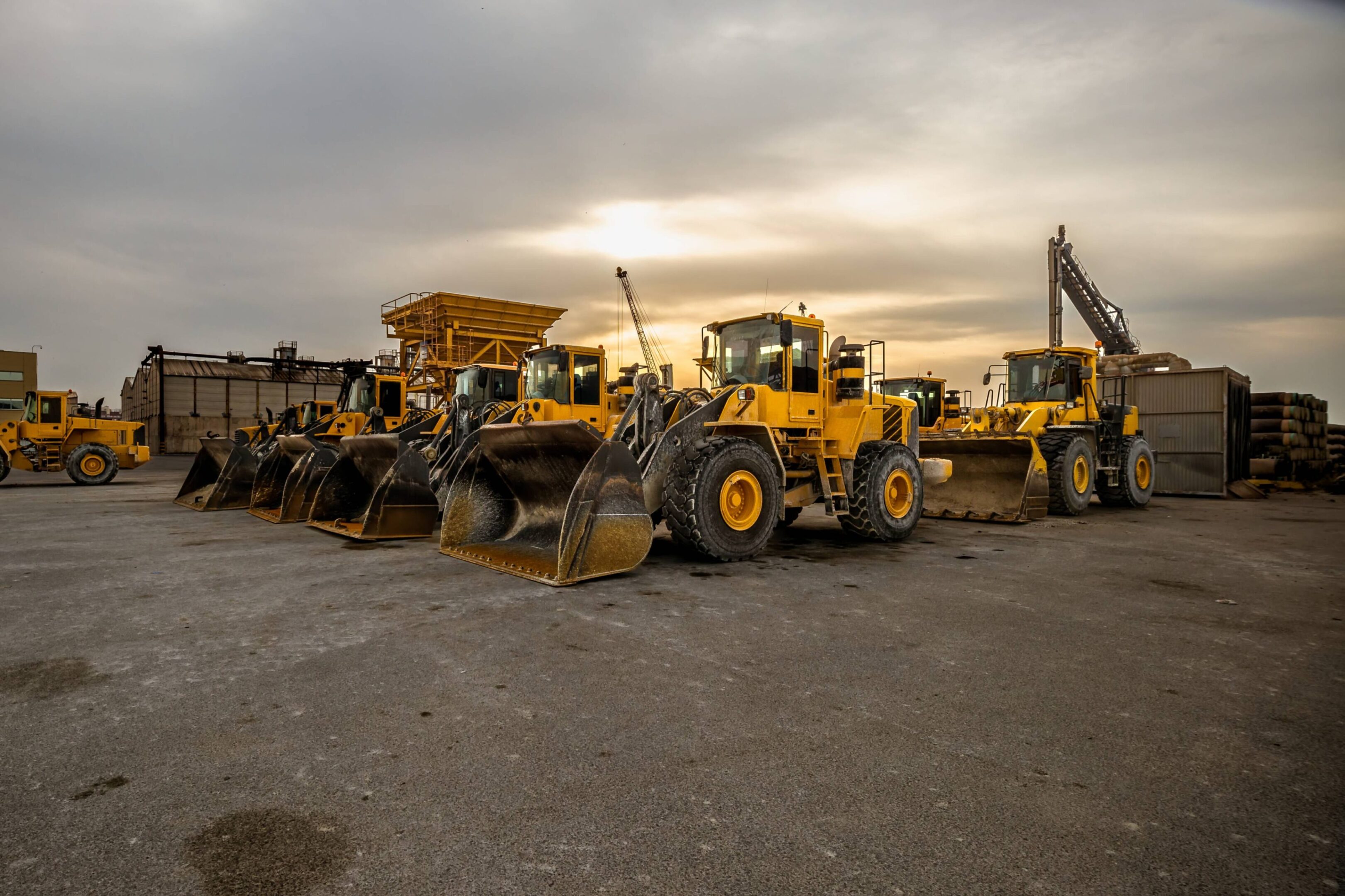 Yellow bulldozers on construction site