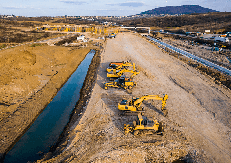 Excavators working on a new road development
